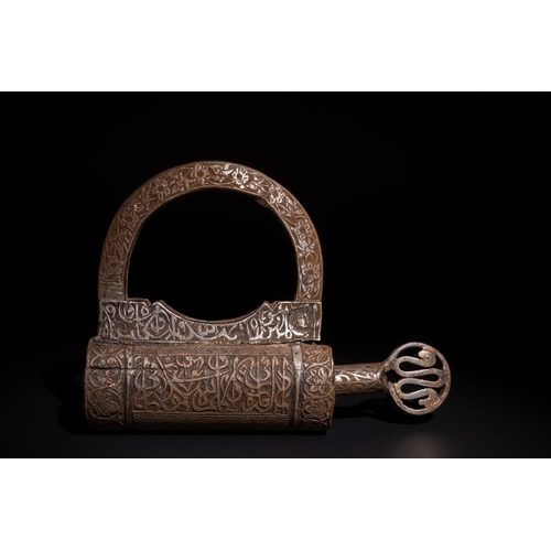 99 - An Islamic Engraved Iron Lock & Key with Intricate Islamic Calligraphy and Floral Patterns.

This Is... 