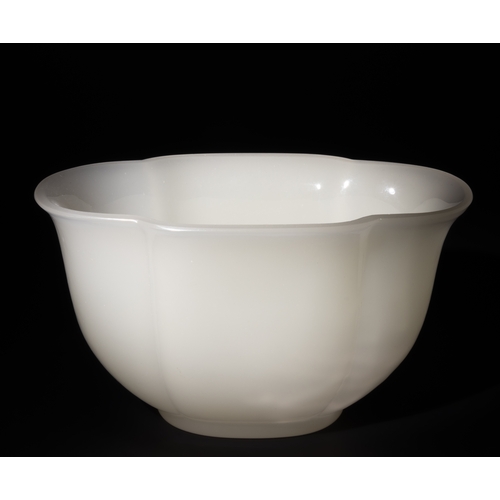 251 - A Chinese White-Glazed Carved Mallow Shaped Bowl.

This Chinese white-glazed bowl is delicately carv... 