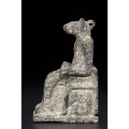 5 - An Egyptian Granitic Statue of a Sitting Figure with Animal Features, Possibly Ancient.

This finely... 