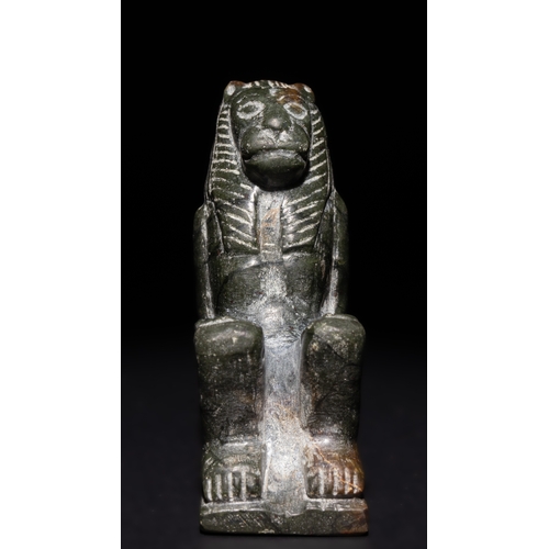 6 - An Egyptian Lioness Statue of Goddess Sekhmet in Green Stone, Possibly Ancient.

This finely carved ... 