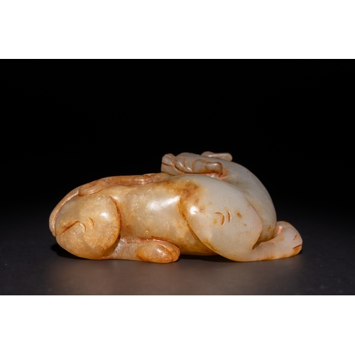 254 - A Chinese Carved Green and Russet Jade Creature, Possibly a Rabbit or Mythical Animal.

This carved ... 