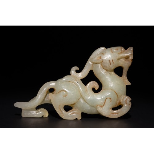 256 - A Chinese Green and Russet Jade Carving of a Mythical Beast.

This detailed Chinese jade carving dep... 