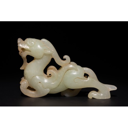 256 - A Chinese Green and Russet Jade Carving of a Mythical Beast.

This detailed Chinese jade carving dep... 