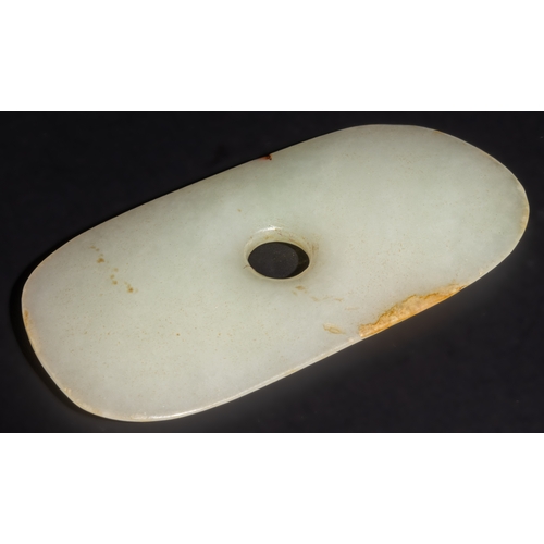 259 - A Chinese Jade Bi Disk with a Central Hole, 19th Century.

This exquisite jade bi disk is a flat, ci... 