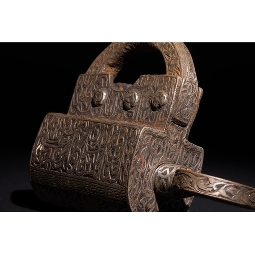 109 - An Islamic Iron Lock & Key with Damascened Islamic Calligraphy and Floral Patterns.

This Islamic ir... 