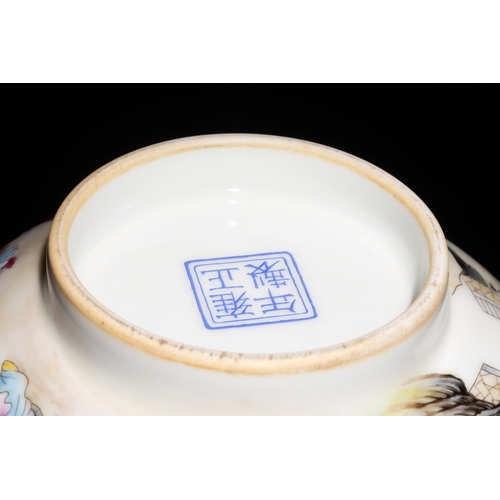 262 - A Chinese Famille Rose Bowl with Outdoor Figures and 4 Character Marks to the Base.

This Chinese po... 