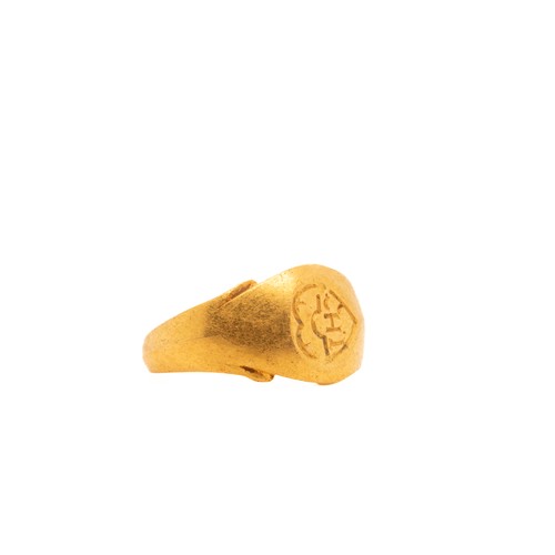 11 - A Byzantine Gold Signet Ring with an Engraved Inscription.

This Byzantine gold signet ring features... 