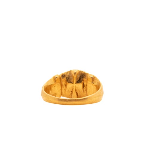 11 - A Byzantine Gold Signet Ring with an Engraved Inscription.

This Byzantine gold signet ring features... 