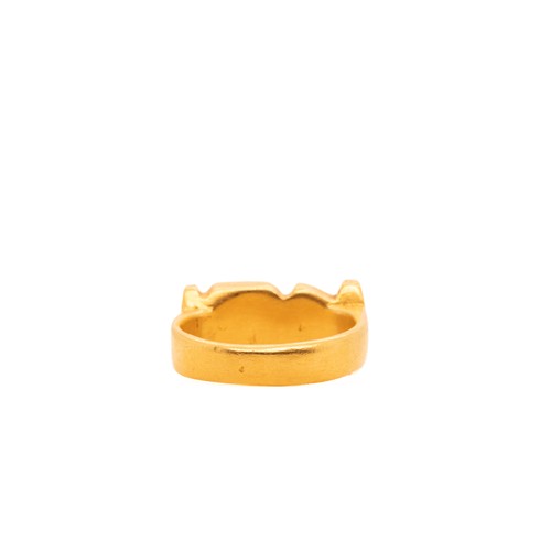 15 - An Egyptian Solid Gold Ring with Hieroglyphic Motif.

The ring features a solid band with engraved h... 