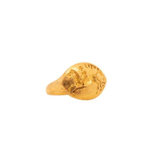 17 - A Roman Solid Ring with Raised Horse and Rider Motif.

The ring features an oval-shaped bezel with a... 