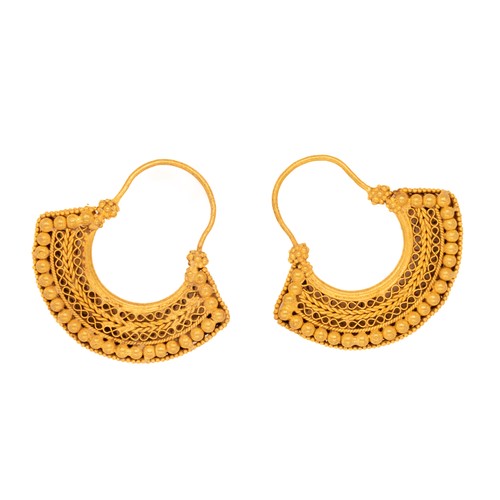 21 - A Pair of Greek Gold Hoop Earrings with Beaded Detailing.

This pair of gold earrings features a tra... 