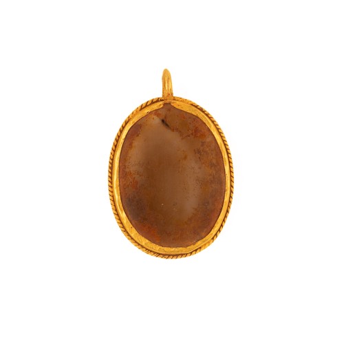 36 - A Roman Gold and Agate Cameo Pendant, Possibly Representing Augustus.

This Roman cameo features a d... 