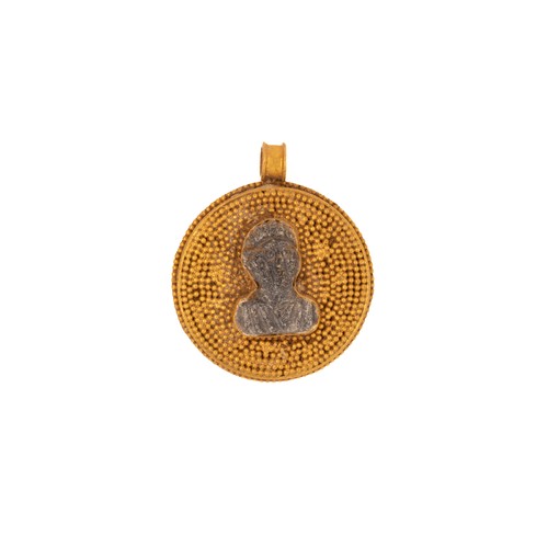 37 - A Roman Gold and Glass Cameo Pendant.

A Roman gold and glass cameo pendant featuring a finely detai... 