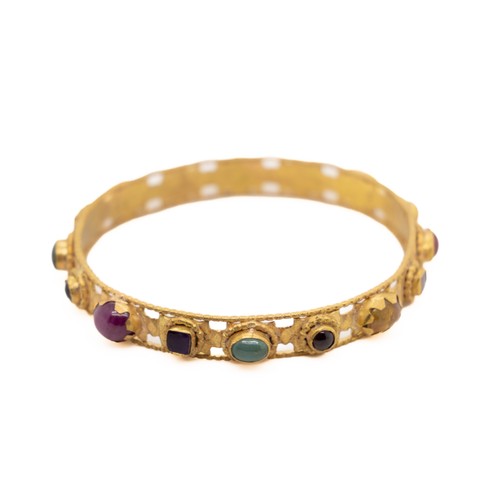 38 - A Late Byzantine Gold Bracelet with Garnet, Ruby, Emerald, and Amethyst, 14th Century or Later.

Thi... 