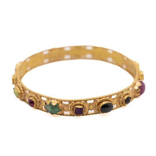 38 - A Late Byzantine Gold Bracelet with Garnet, Ruby, Emerald, and Amethyst, 14th Century or Later.

Thi... 