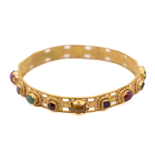 38 - A Late Byzantine Gold Bracelet with Garnet, Ruby, Emerald, and Amethyst, 14th Century or Later.

Thi... 