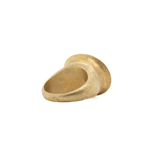 39 - A Roman Gold Hollow Ring with Cameo.

This Roman gold ring features a distinctive hollow band and is... 