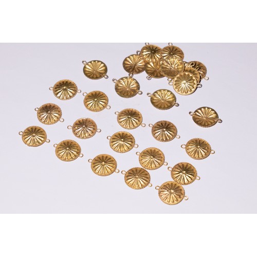 48 - A Lot of Roman Gold Discs with Floral Design.

This collection features numerous Roman gold discs, e... 