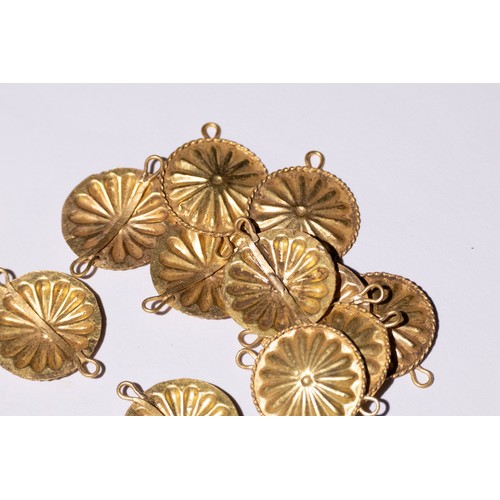 48 - A Lot of Roman Gold Discs with Floral Design.

This collection features numerous Roman gold discs, e... 