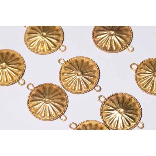 48 - A Lot of Roman Gold Discs with Floral Design.

This collection features numerous Roman gold discs, e... 