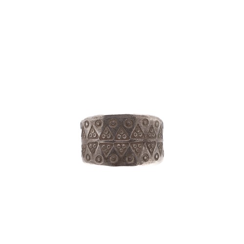 56 - A Viking Silver Band Ring with Intricate Geometric Patterns.

This Viking silver ring showcases a wi... 