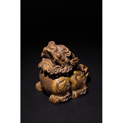 266 - A Chinese Ceramic Mythical Beast Tea Pet.

A Chinese ceramic tea pet in the form of a mythical beast... 