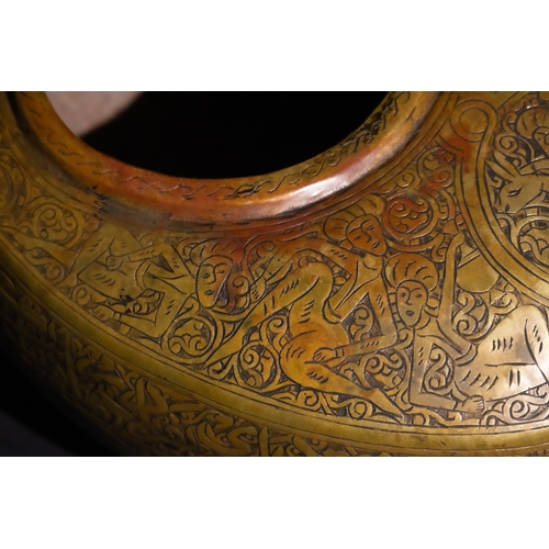 116 - A Qajar Brass Kashkul Beggar's Bowl with Islamic Calligraphy, 19th Century.

A brass Kashkul featuri... 