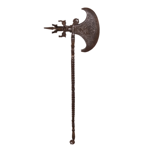 129 - An Islamic Ceremonial Iron Axe with Islamic Calligraphy and Intricate Patterns.

An Islamic ceremoni... 