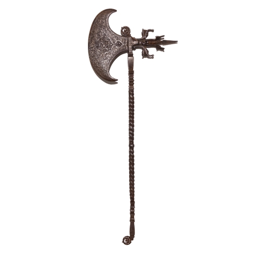 129 - An Islamic Ceremonial Iron Axe with Islamic Calligraphy and Intricate Patterns.

An Islamic ceremoni... 