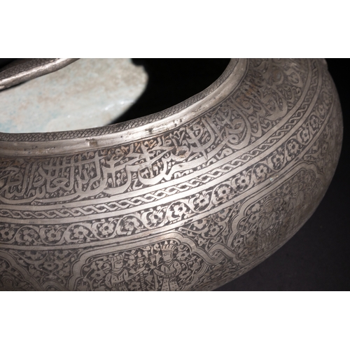 138 - An Islamic Qajar Iron Kashkul Beggar's Bowl with Intricate Inlay and Figurative Motifs.

This Qajar ... 