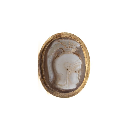 39 - A Roman Gold Hollow Ring with Cameo.

This Roman gold ring features a distinctive hollow band and is... 