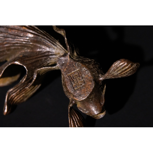 181 - A Japanese Bronze Goldfish Sculpture with a Mark to the Base.

A Japanese bronze figure of a goldfis... 