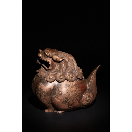81 - A Chinese Bronze Censer in the Form of a Seated Temple Lion.

A Chinese bronze censer modelled as a ... 