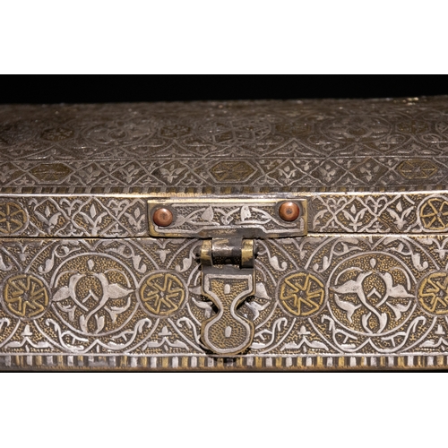 7 - An Islamic Mamluk Style Brass Qalamdan Pen Box with Intricate Silver Inlay.

This pen box features a... 