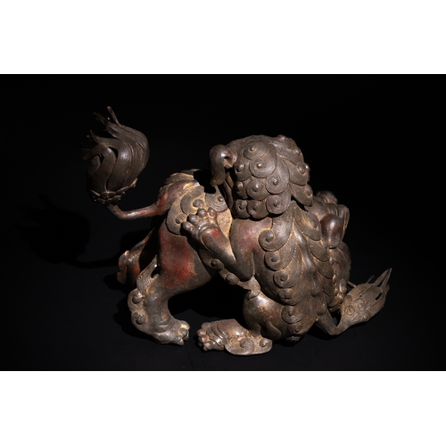 86 - A Chinese Bronze Censer in the form of Two Guardian Lion Dogs.

This Chinese incense burner is sculp... 