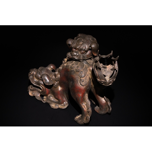 86 - A Chinese Bronze Censer in the form of Two Guardian Lion Dogs.

This Chinese incense burner is sculp... 