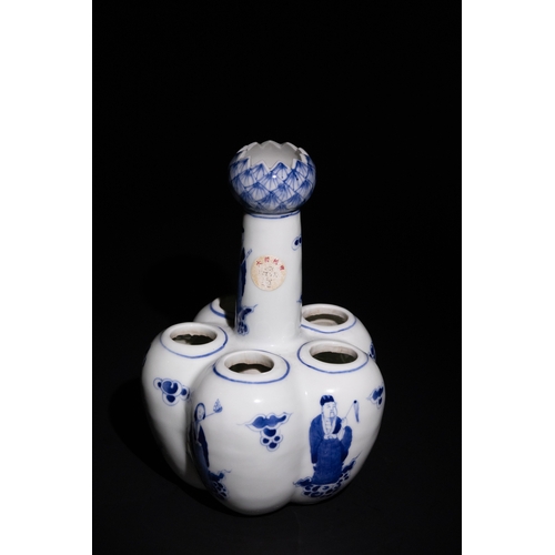 87 - A Chinese Blue and White Porcelain Multi-Sprouted Tulip Vase.

This Chinese blue and white porcelain... 