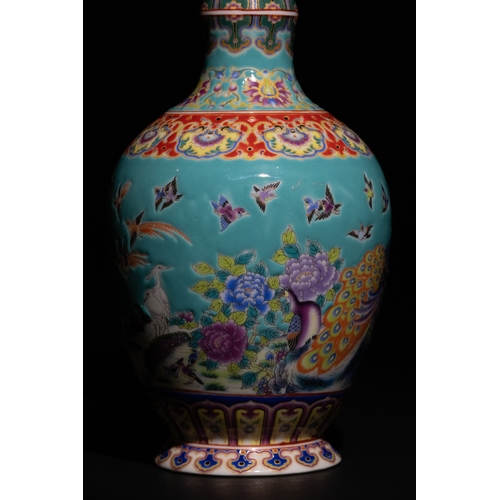 88 - A Chinese Turquoise-Ground Porcelain Vase with Floral and Bird Motifs with 4 Character Marks to the ... 