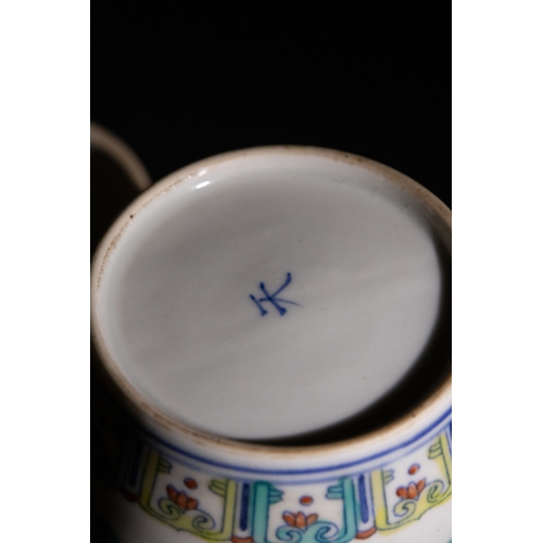 90 - A Chinese Famille Rose Porcelain Jar with Floral Motifs, with a Character Mark to the Base.

This Ch... 