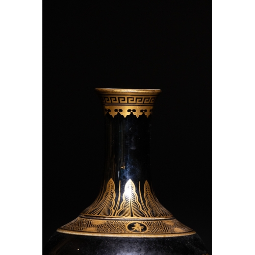 93 - A Chinese Black Ground Porcelain Vase with Gilded Patterns & Character Marks to the Base.

A Chinese... 