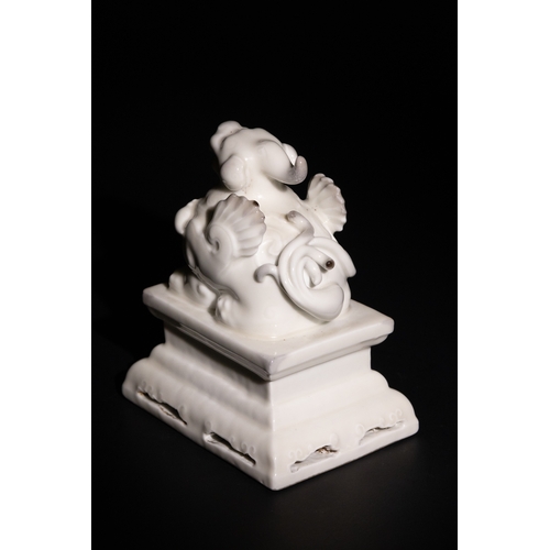 96 - A Chinese Blanc-de-Chine Porcelain Foo Dog Figure on a Pierced Base, with Character Marks to the Bas... 