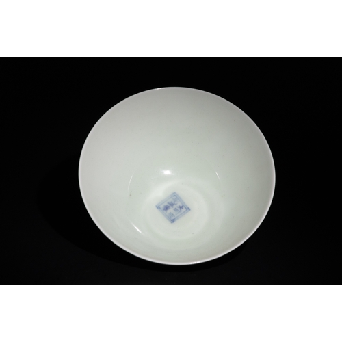 98 - A Chinese Famille Verte Porcelain Bowl with Bamboo, Plum, and Pine Motifs.

A Chinese porcelain bowl... 