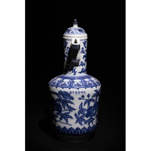 101 - A Chinese Blue and White Porcelain Ewer with Peony and Vine Motifs.

This blue and white porcelain e... 