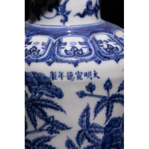 101 - A Chinese Blue and White Porcelain Ewer with Peony and Vine Motifs.

This blue and white porcelain e... 