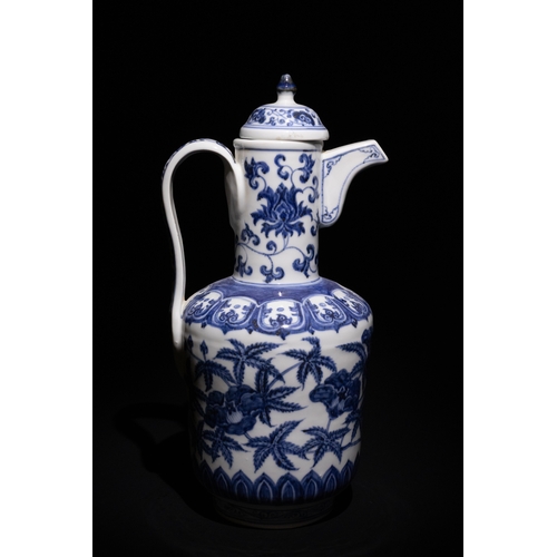 101 - A Chinese Blue and White Porcelain Ewer with Peony and Vine Motifs.

This blue and white porcelain e... 