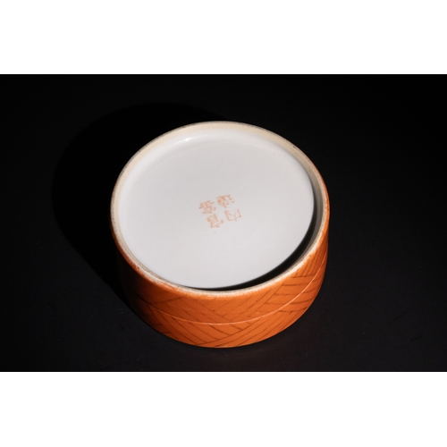 107 - A Chinese Porcelain Lidded Box with Crane and Waves Design.

A circular lidded box featuring a crane... 