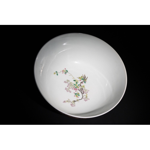 109 - A Chinese Porcelain Red Ground Bowl with Floral and Bird Motifs & Four Character Marks to the Base.
... 