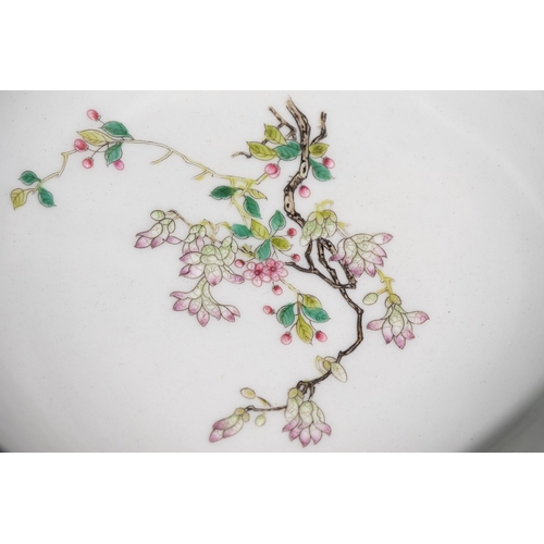 109 - A Chinese Porcelain Red Ground Bowl with Floral and Bird Motifs & Four Character Marks to the Base.
... 
