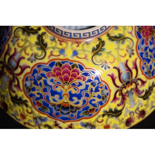 112 - A Chinese Imperial Yellow Ground Bowl with Turquoise Interior and Floral Motifs & Character Marks to... 