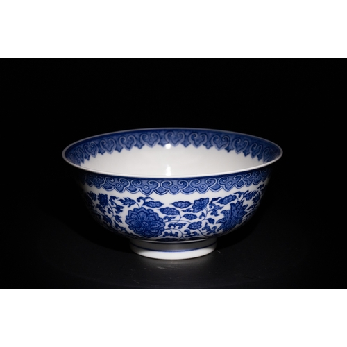 119 - A Chinese Blue and White Porcelain Bowl with Floral and Scroll Motifs & Six Character Marks to the B... 